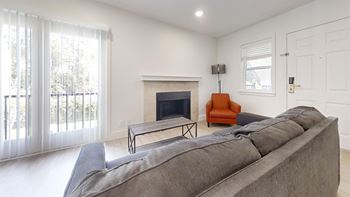Spacious living room with private balcony