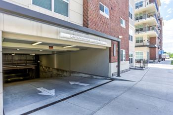 Parking garage with a caution sign on the wall