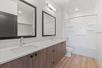 Bathroom with large mirror