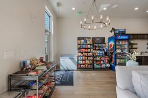 Provo apartment for rent - the reserve at city center spacious lobby with snacks and a vending machine at 200 City View, Provo, UT