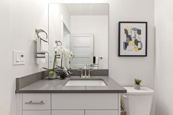 Bathroom with mirror and sink