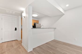 White kitchen with a wooden floor6