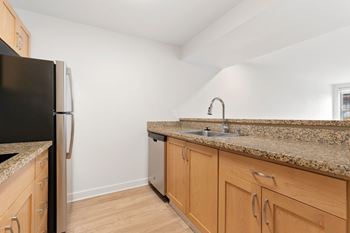 Kitchen with wooden cabinets and sink7