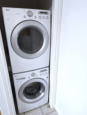 Provo apartment for rent - Two white LG front load washing machines in a small space.