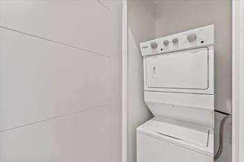 A white dishwasher is installed in a kitchen.