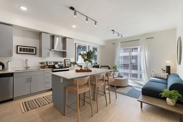 Salt Lake City apartment for rent - a kitchen and living room with an island and a couch