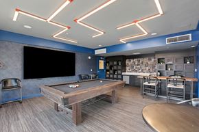 Salt Lake City apartment for rent - a game room with a pool table and a tv at Paperbox Lofts, Utah, 84101