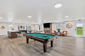 Rapid City apartment for rent - our apartments have a game room with a pool table and a bar at Red Rock Apartments, Rapid City, 57702