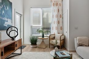 Salt Lake City apartment for rent - a living room with a couch and a table and a window at SevenO2 Main Apartments, Salt Lake City, 84101