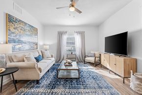 Ogden apartment for rent - a living room with a couch and a tvat The View on 20th, Ogden, Utah