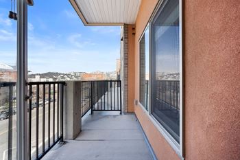Balcony with concrete floor and overhead covering