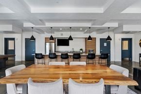 Provo apartment for rent - a large dining room with a large table and chairs at The Flats at Riverwoods, Provo, Utah