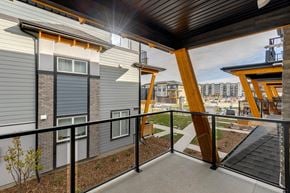 Calgary townhouse for rent - the preserve at ballantyne commons apartment balcony and city views