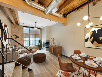 Chicago apartment for rent - a living room with a table and chairs and a staircase
