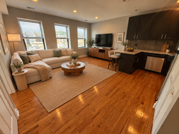 Chicago apartment for rent - A living room with a white couch and a coffee table.