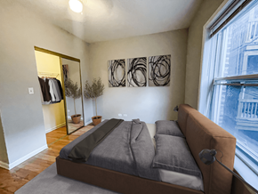 Chicago apartment for rent - Barry Court Apartments bedroom with a Queen bed and a large window