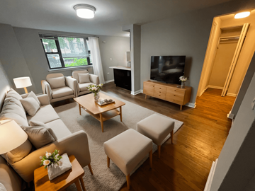 Chicago apartment for rent - a living room with a couch and a tv