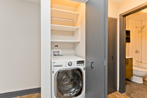 Chicago apartment for rent - A washing machine is in a small room.