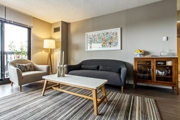 Chicago apartment for rent - a living room with a couch and a coffee table
