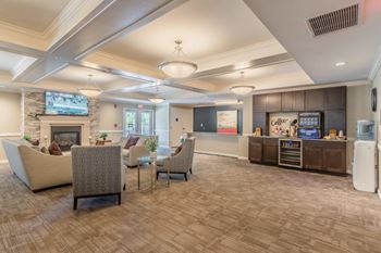 Clubhouse lounge with coffee station and seating
