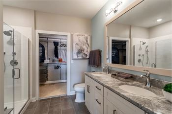 Bathroom with large mirror