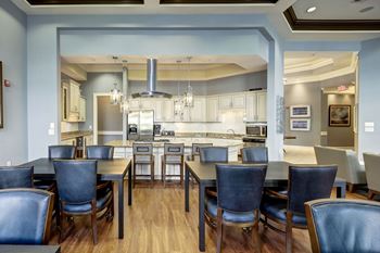 Community dining area with open kitchen