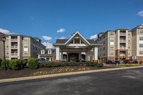 Ellicott City apartment for rent - Apartment community entrance with brick columns at Regency Crest Apartments, Ellicott City, Maryland