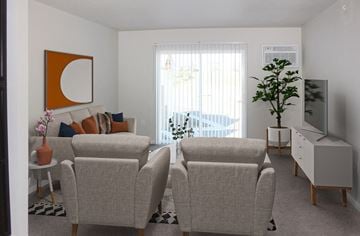 Rochester apartment for rent - a living room with two chairs and a couch and a tv
