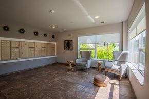 Vadnais Heights apartment for rent - A room with a table, chairs and a window.