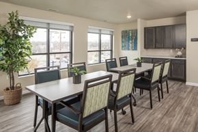 St. Paul apartment for rent - A dining room with a table and chairs.