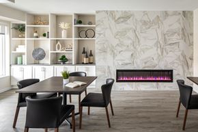 Burnsville apartment for rent - A modern dining room with a table set for four.