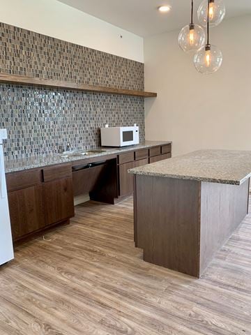 Waconia apartment for rent - a kitchen with a microwave and a counter top