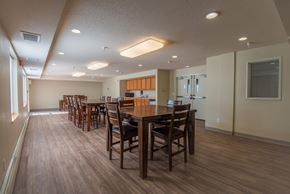 Rochester apartment for rent - a large dining room with a large table and chairs
