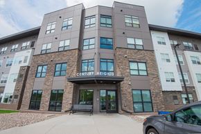 Rochester apartment for rent - a building with a car parked in front of it