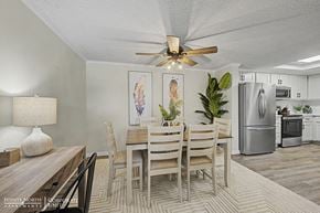 Albany apartment for rent - A dining room with a wooden table and chairs.
