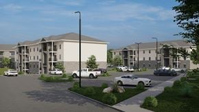 Shelbyville apartment for rent - A rendering of a modern apartment complex with cars parked in the driveway.