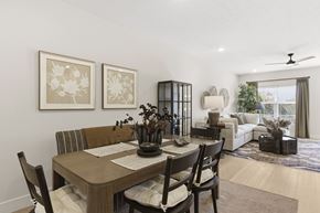 Richfield apartment for rent - A dining room with a wooden table and chairs.