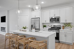 Sagamore Hills apartment for rent - a kitchen with white cabinets and a white counter top