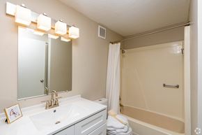 Cuyahoga Falls apartment for rent - A bathroom with a white sink and a white towel.