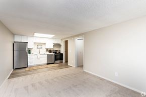 Cuyahoga Falls apartment for rent - A kitchen with white appliances and a white wall.