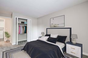 Lakewood apartment for rent - a bedroom with a bed and a closet
