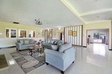 Glendale apartment for rent - A living room with a grey couch and a coffee table.