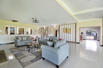 Glendale apartment for rent - a living room with couches and a table