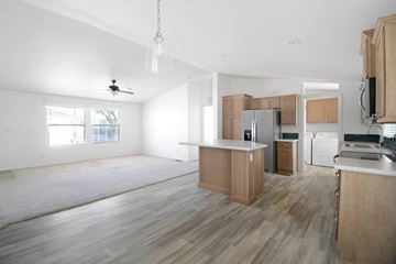 Glendale apartment for rent - A kitchen with wooden cabinets and a white ceiling.