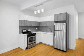 Brooklyn apartment for rent - A kitchen with a stove, oven, and refrigerator.
