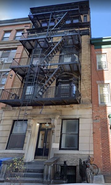 Brooklyn apartment for rent - A fire escape on a brick building.