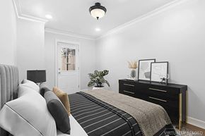 Brooklyn apartment for rent - A bedroom with a bed, nightstand, and lamp.