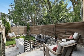 Brooklyn apartment for rent - A patio with a table, chairs, and a grill.