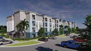Crystal River apartment for rent - A modern apartment complex with a parking lot in front.