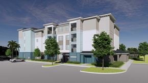 Crystal River apartment for rent - A modern apartment building with a parking lot in front.
